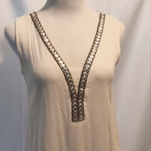 Elegant Cream Sleeveless Top with Gold Accents